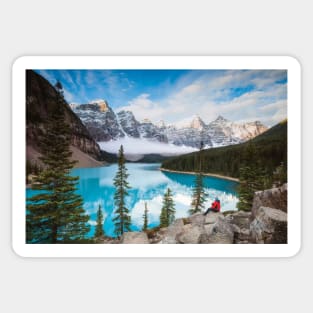 Man Sitting Near Moraine Lake Banff National Park Sticker